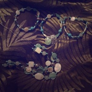 Three bracelets and a necklace set